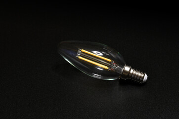 closeup of a light bulb on a black background