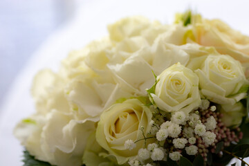 Close up white roses bouquet for ceremonial use with copy paste background