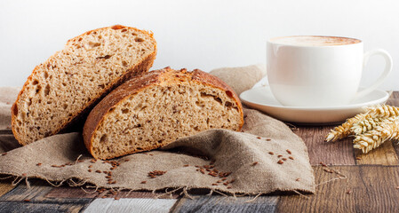 fresh bread on wooden background 