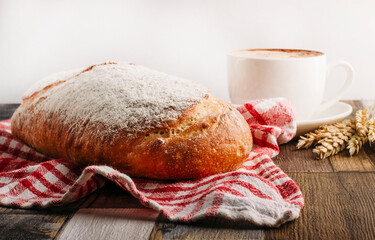 fresh bread on wooden background 