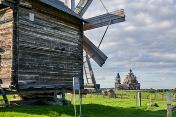 Russia. Kizhi Island on Lake Onega. View of the Kizhi churchyard from behind the windmill