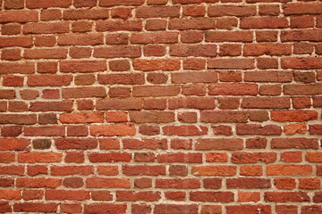 Panoramic view of empty, old, red brick wall background with copy space