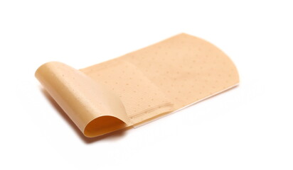 Medical adhesive aid, plaster isolated on white background, side view 