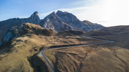 Wall murals Dolomites Curvy road at Passo Giau in the italian dolomites near Cortina d'Ampezzo during autumn season