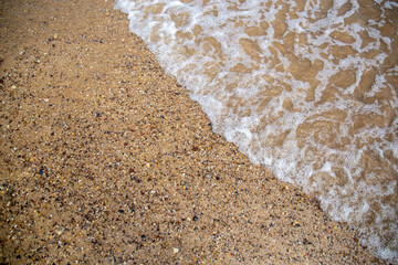 Waves on the shore of the beach