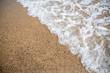 Waves on the shore of the beach