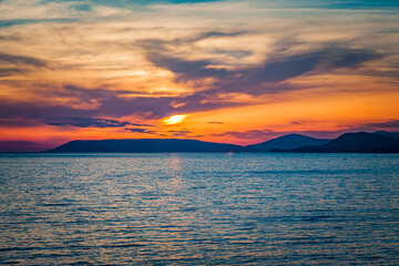 Dramatic sunset from the coastal town of Trogir, Croatia looking out over the Adriatic