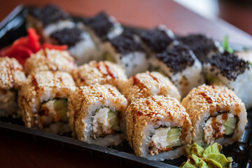 A set of sushi with different fillings and names