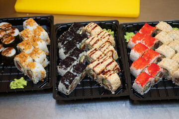 A set of sushi with different fillings and names