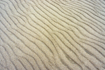 Sea sand. Sandy background. Sandy texture. Natural sea sand and river sand.