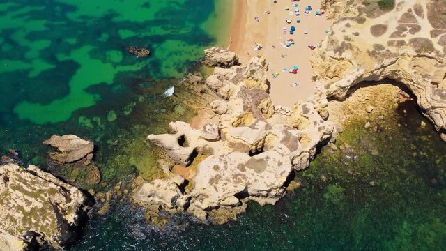 Aerial drone view of Praia do Castelo beach, Albufeira, Algarve, Portugal