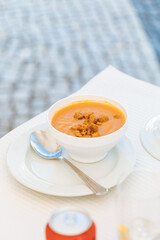 Shellfish soup served in bowl ready to eat