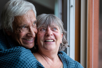 Happy couple in love embracing, middle aged smiling family enjoying tender moment, happy marriage,...