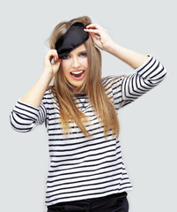 Trouble Sleeping,woman trying to sleep with a mask, girl holding  eye mask is the best for sleeping