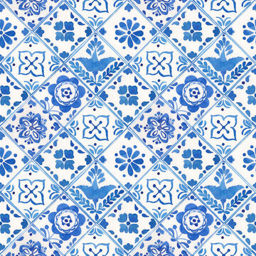 Watercolor blue style porcelain seamless pattern, dutch ceramic tiling ornament. Old fashion hand-drawn rustic floral motifs. Stylized flowers on a background in cells.