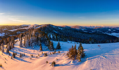 Magical winter panorama of beautiful snowy slopes