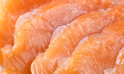 Salmon sashimi close-up , raw sliced salmon meat close-up - selective focus