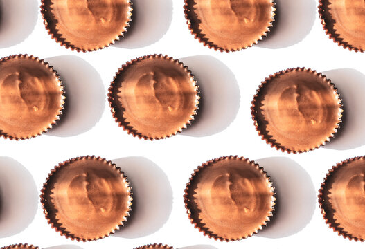 Peanut butter filled candy with chocolate frosting isolated on white background