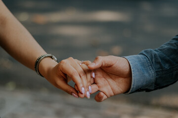 bride and groom holding hands