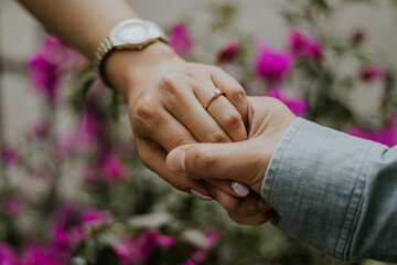 Fototapeta premium bride and groom holding hands