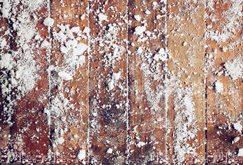 Christmas background with snow on a wood floor