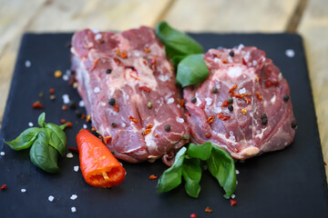 Fresh lamb meat with spices. Raw farm lamb.