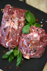Fresh lamb meat with spices. Raw farm lamb.