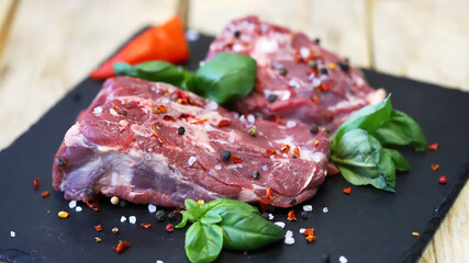 Fresh lamb meat with spices. Raw farm lamb.