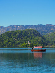 Fototapeta na wymiar River Gondola on the Lake Bled