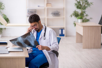 Young male doctor radiologist working in the clinic