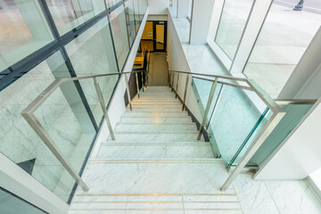 Obraz premium Abstract fragment of architecture of modern lobby, hallway of the luxury hotel, shopping mall, business center in Vancouver, Canada. Interior design.