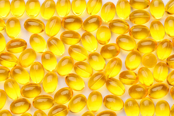 Vitamin A capsules as background, closeup