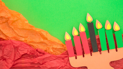 Happy Kwanzaa Greeting Card Background. Candleholder made from paper leaves. Paper art concept, Banner mockup
