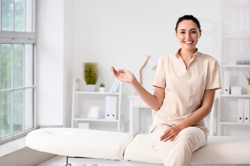 Female massage therapist at workplace