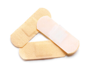 Medical plasters on white background