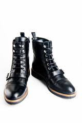 fashionable black womens boots with a strap