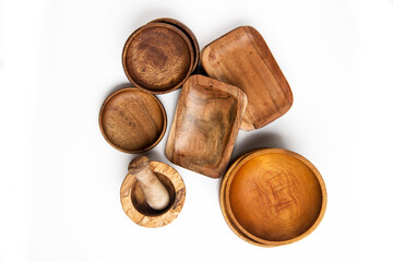 wooden tableware cups, bowls and stupa on white background