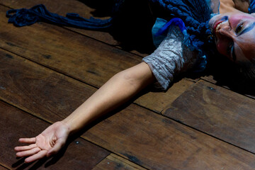 Actor and actress stretching and warming up their vocal chords to go on stage in a theater and act...