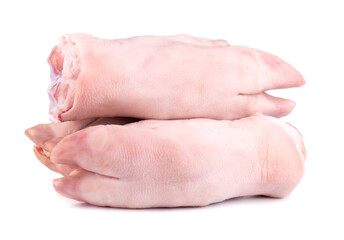 Raw pork hooves isolated on white background. Fresh pig legs.
