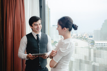 business partner meeting concept, businessman and woman talking together in work office
