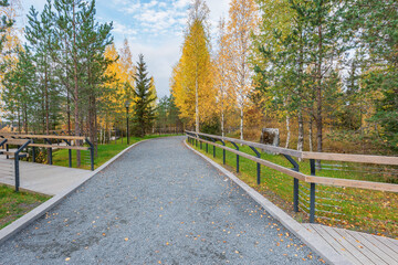 Path in the mountain city park at evening time.