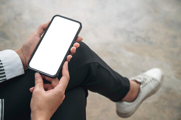 woman hands holding blank screen smartphone.