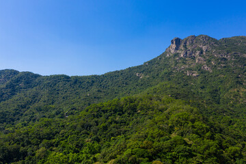 Lion Rock mountain over blue sky in Hong Kong