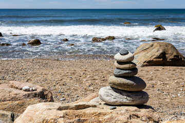 Fototapeta na wymiar peaceful stack on rocks on a beach 