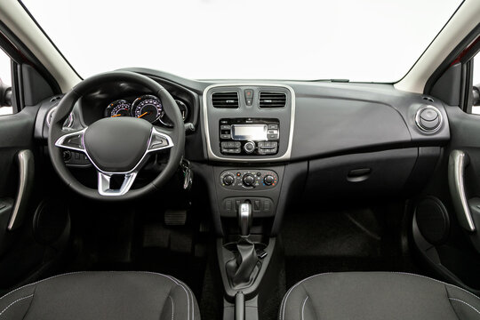 close-up of the dashboard, player, steering wheel, accelerator handle, buttons, seats.