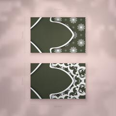 Dark green business card with Indian white pattern for your brand.