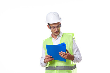 engineer in working uniform protective clothing documents construction