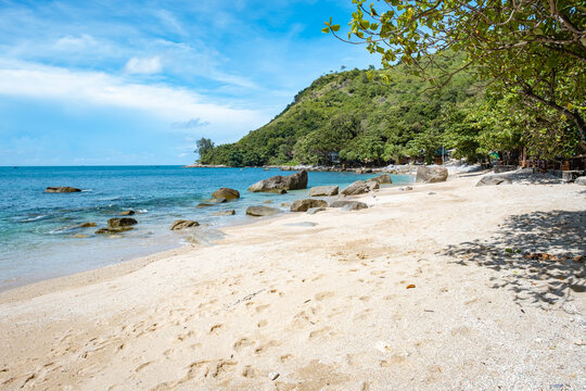 Ao Sane Jungle beach Phuket Thailand, beach with rocks and blue ocean in Phuket Thailand