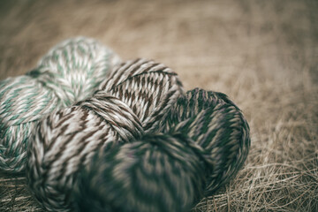 Knitting needles, colorful threads. Knitting pattern of colorful yarn wool. Knitting background....