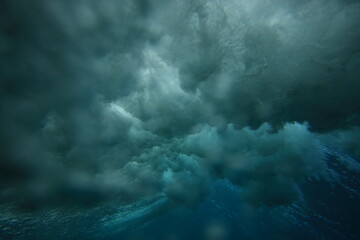 wave breaking viewed from underwater